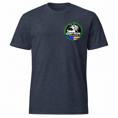 A heather navy blue short-sleeve t-shirt with a circular green, white, and red graphic on the left chest featuring a goat and the text 'GOAT ROPE'.