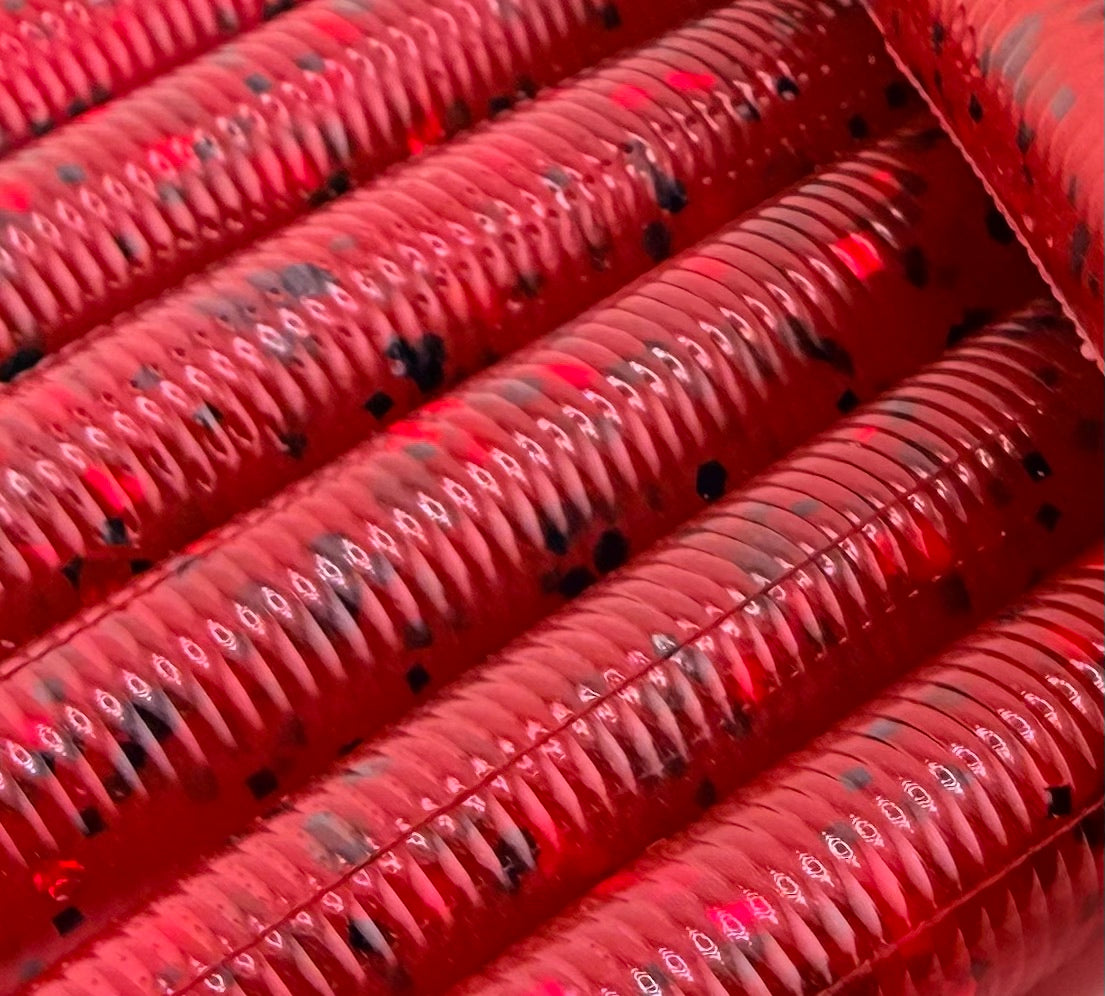 Transparent red soft plastic with black and red flake