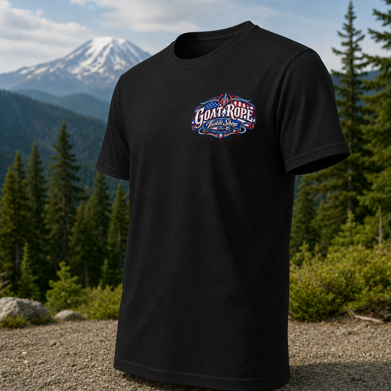 A black short-sleeve t-shirt with a colorful 'Goats Rope' logo on the chest, displayed against a scenic mountain and forest background.
