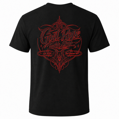A black short-sleeve t-shirt shown from the back, featuring a large red graphic print with the words 'Goat Rope Tackle Shop' and 'Est. 2026' in a stylized design.